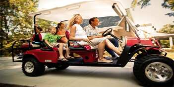 Photo of family on a Golf Cart going to Put-in-Bay Attractions